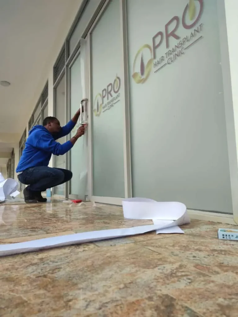 Applying frosted window graphics in an office